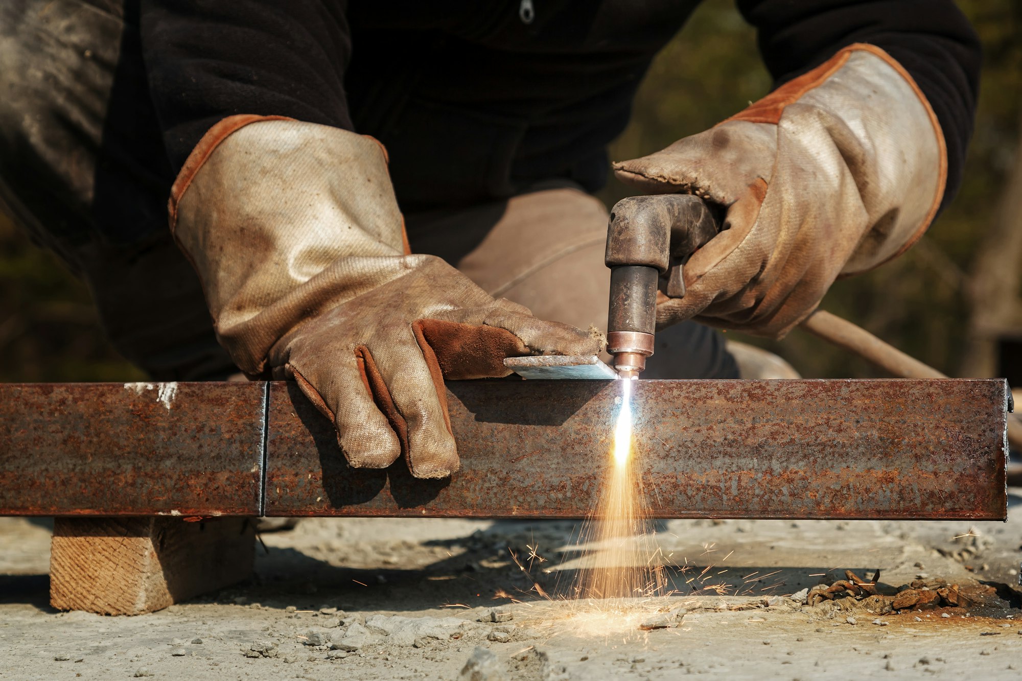Plasma cutting for workpieces. Sparks during cutting of metal manual plasma cutting machine.